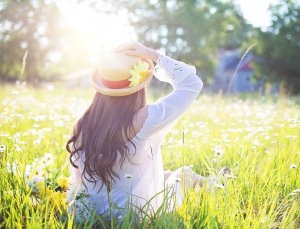 Woman sunbathes